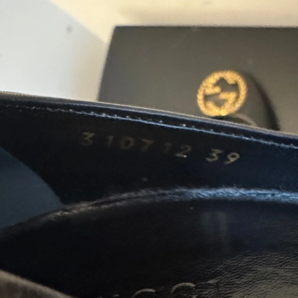 Gucci Black Heels with Iconic Gucci Gold Emblem